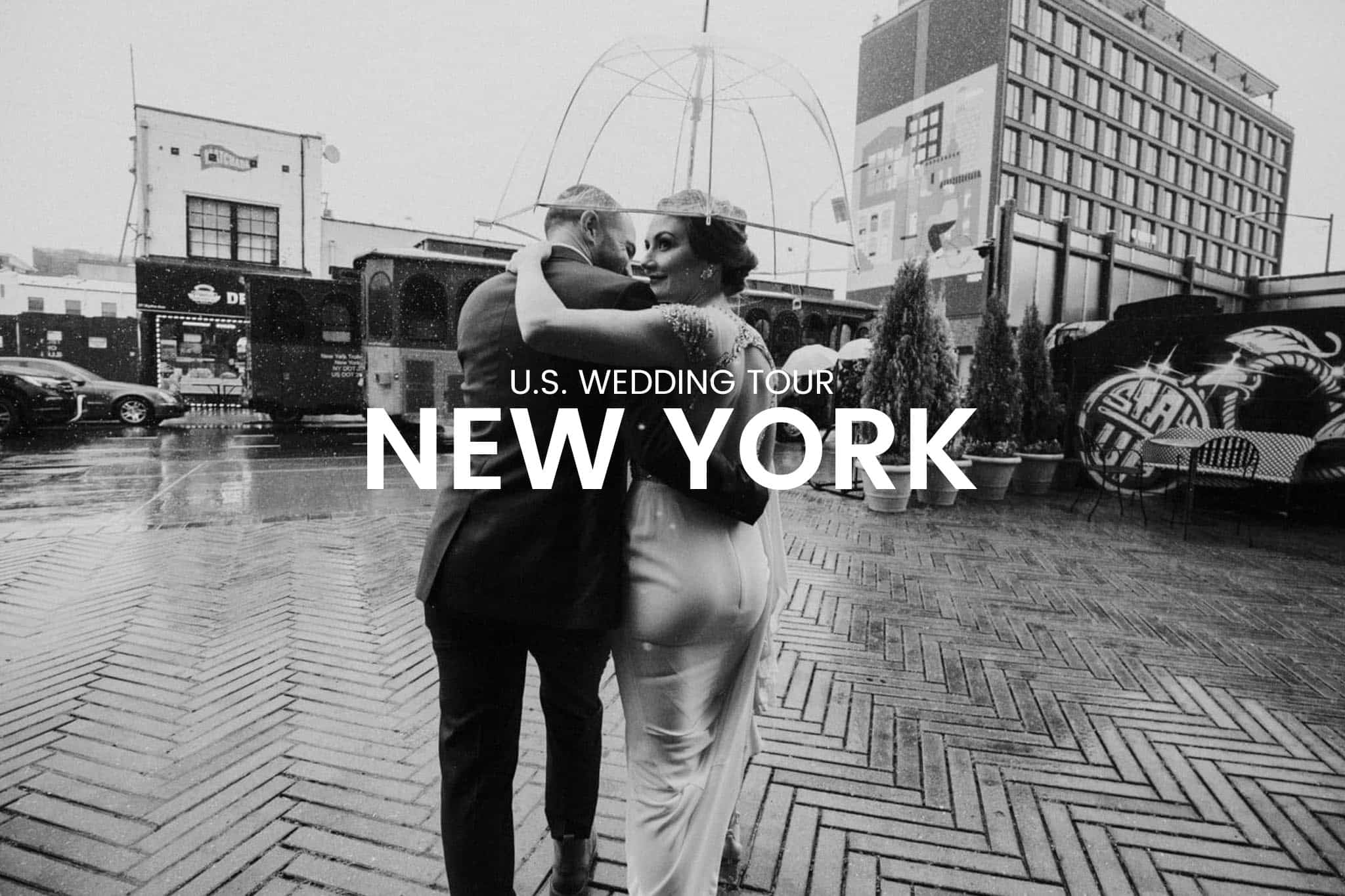 wedding couple walking with a transparent umbrella in new york