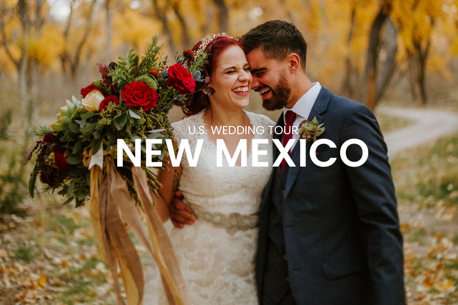 Very happy wedding couple enjoying the moments after the ceremony with a background of trees in New Mexico in the fall