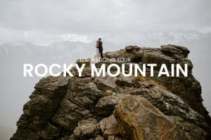Wedding couple at the top of the mountain with snow
