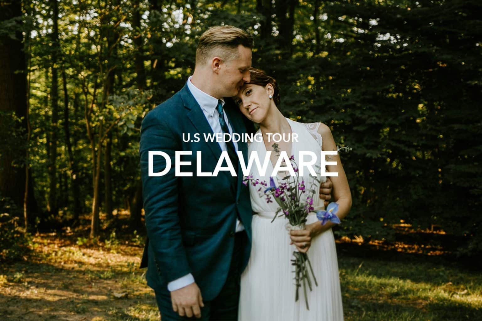 Groom and Bride embracing with great affection and in the background with trees
